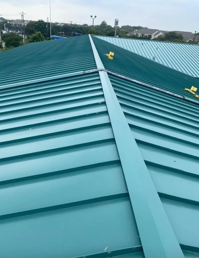 Green commercial metal roof ridge and valley for Metal Roof Repair in Mequon